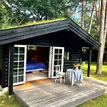Charming Log House In Asserbo's Nature