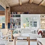Charming Log House In Asserbo's Nature