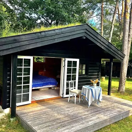 Charming Log House In Asserbo's Nature