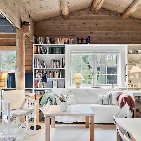 Charming Log House In Asserbo's Nature