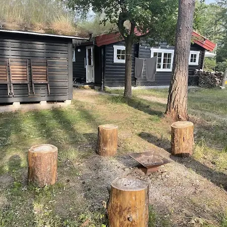 Ferienhaus Charming Log House In Asserbo's Nature *