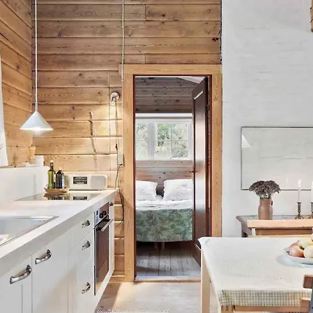 Charming Log House In Asserbo's Nature