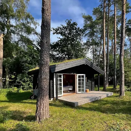 Charming Log House In Asserbo's Nature
