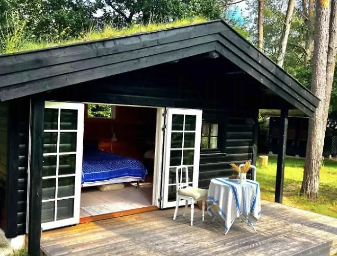 Charming Log House In Asserbo's Nature