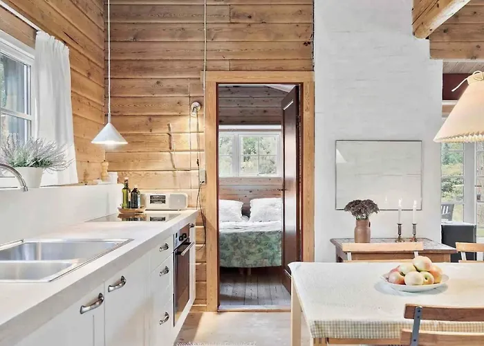 Charming Log House In Asserbo's Nature